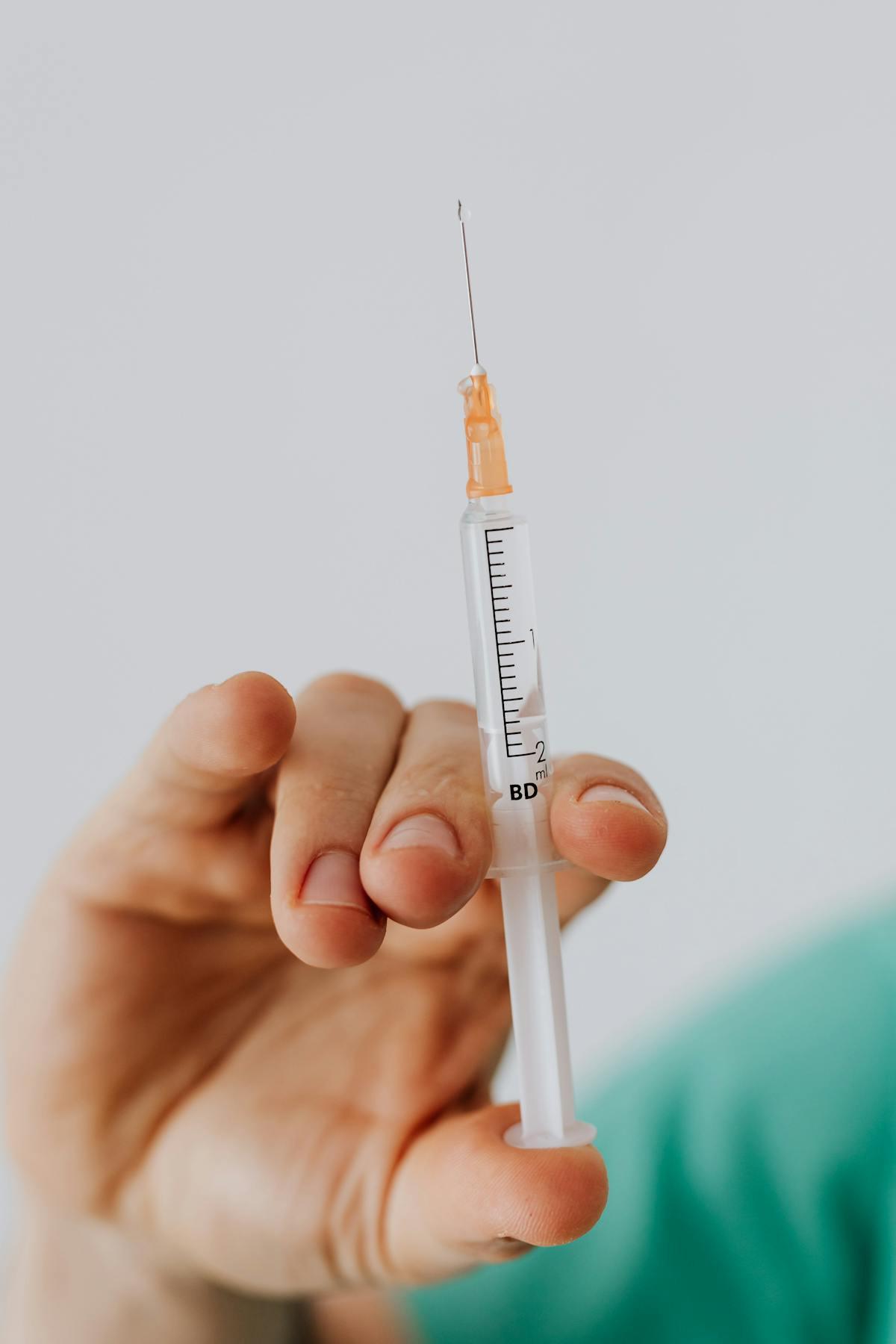 Peptide Therapy — medical professional administering peptide injection